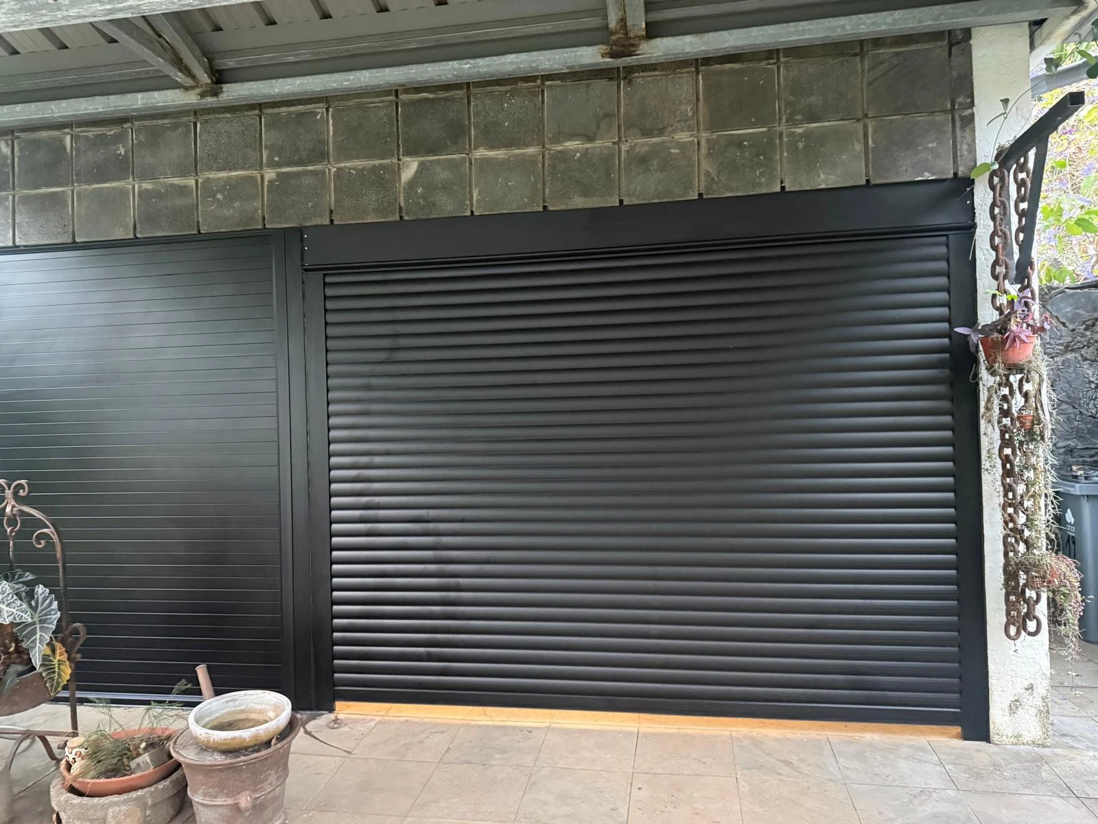 Adaptation aluminium sur mesure volet roulant garage